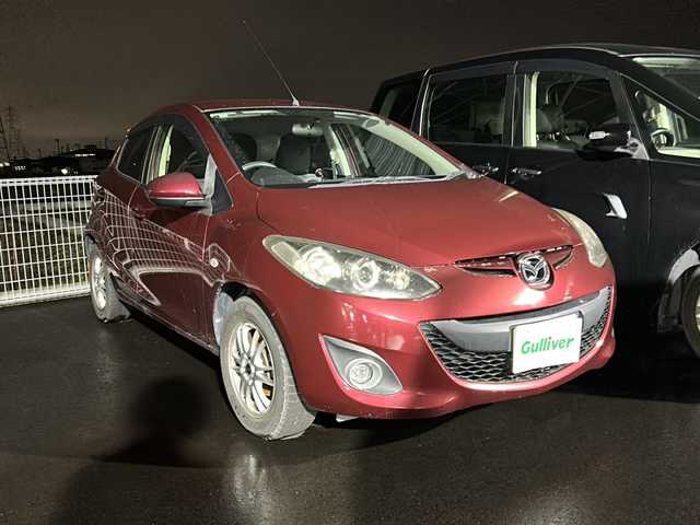 マツダ デミオ 13C－V スマートEDⅡ 岐阜県 2013(平25)年 8.8万km バーガンディレッドマイカ pioneerナビ（C9P9）/ETC/社外アルミホイールスタッドレス積み込み/電格ミラー/Bluetooth接続/DVD/CD/フォグランプ/純正フロアマット/純正ドアバイザー/純正アルミキャップ