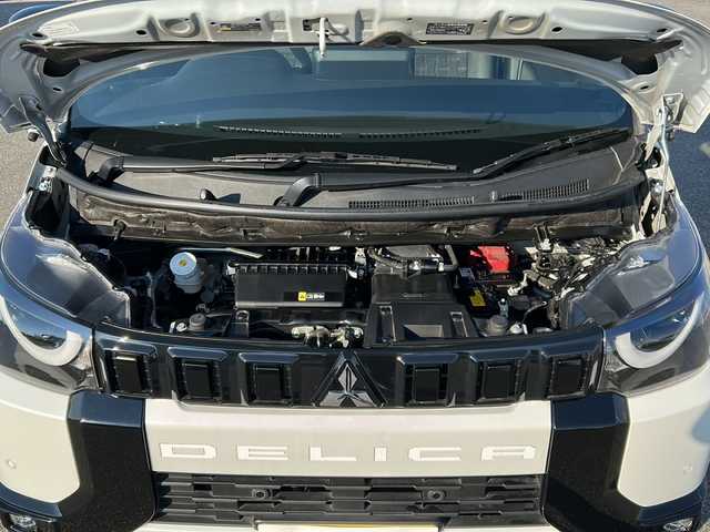 三菱 デリカミニ T プレミアム 富山県 2023(令5)年 0.7万km アメジストブラック/シルキーホワイト 4WD/ワンオーナー/デジタルインナーミラー/e-Assist/衝突被害軽減ブレーキ/踏み間違い衝突防止アシスト/オートマチックハイビーム/標識認識システム/先行車発進通知/車線逸脱警報システム/車線逸脱防止支援機能/ふらつき警報/レーダークルーズコントロール/クリアランスソナー/社外SDナビ/フルセグ/全方位カメラ/両側パワースライドドア/キックモーションセンサー/ステアリングヒーター/シートヒーター/ルーフキャリア/マッドタイヤ/ブロックタイヤ/ラゲッドテレーン/マッドガード
