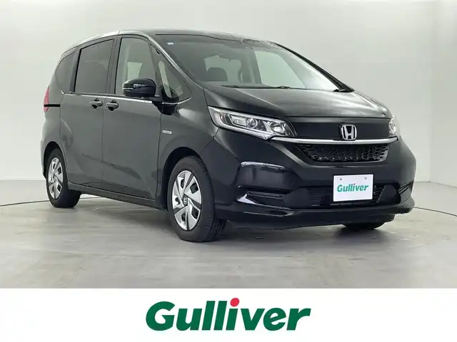 ホンダ フリード ハイブリット G ホンダセンシング 福井県 2021(令3)年 2.5万km クリスタルブラックパール 純正ナビ/CD/DVD/Bluetooth/フルセグ/両側パワースライドドア/ホンダセンシング/・衝突軽減ブレーキ/・アダプティブクルーズコントロール/・誤発進抑制機能/・路外逸脱抑制機能/・先行車発進お知らせ機能/ドライブレコーダー/ETC/LEDヘッドライト