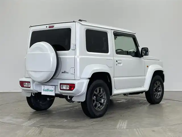 スズキ ジムニー シエラ JC 埼玉県 2023(令5)年 0.8万km ピュアホワイトP 4WD/5MT/社外オーディオ/ CD Bluetooth USB/スズキセーフティーサポート/デュアルセンサーブレーキサポート/レーンキープアシスト/アダプティブクルーズコントロール/先行車発進お知らせ機能/LEDオートライト/ETC
