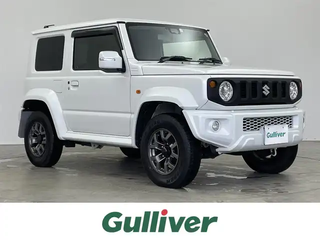 スズキ ジムニー シエラ JC 埼玉県 2023(令5)年 0.8万km ピュアホワイトP 4WD/5MT/社外オーディオ/ CD Bluetooth USB/スズキセーフティーサポート/デュアルセンサーブレーキサポート/レーンキープアシスト/アダプティブクルーズコントロール/先行車発進お知らせ機能/LEDオートライト/ETC