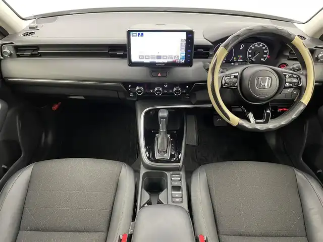 ホンダ ヴェゼル ハイブリッド e:HEV Z 富山県 2023(令5)年 2.9万km サンドカーキパール ワンオーナー/寒冷地仕様/社外9型ナビ【MDV-M909HDF】/(AM/FM/CD/DVD?SD/USB/BT/HDMI)/フルセグTV/バックカメラ/衝突被害軽減ブレーキ/レーンキープアシスト/アダプティブクルーズコントロール/ブラインドスポットモニター/クリアランスソナー/アダプティブハイビーム/LEDヘッドライト/電動リアゲート/ハーフレザーシート/前席シートヒーター/ETC/ドライブレコーダー前後/ステアリングヒーター/ステアリングカバー/スマートキー×２/プッシュスタート/純正18インチAW/ドアバイザー/取扱説明書/保証書