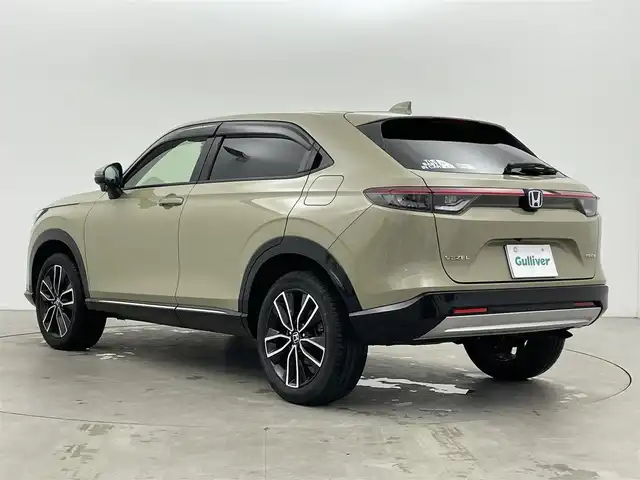 ホンダ ヴェゼル ハイブリッド e:HEV Z 富山県 2023(令5)年 2.9万km サンドカーキパール ワンオーナー/寒冷地仕様/社外9型ナビ【MDV-M909HDF】/(AM/FM/CD/DVD?SD/USB/BT/HDMI)/フルセグTV/バックカメラ/衝突被害軽減ブレーキ/レーンキープアシスト/アダプティブクルーズコントロール/ブラインドスポットモニター/クリアランスソナー/アダプティブハイビーム/LEDヘッドライト/電動リアゲート/ハーフレザーシート/前席シートヒーター/ETC/ドライブレコーダー前後/ステアリングヒーター/ステアリングカバー/スマートキー×２/プッシュスタート/純正18インチAW/ドアバイザー/取扱説明書/保証書