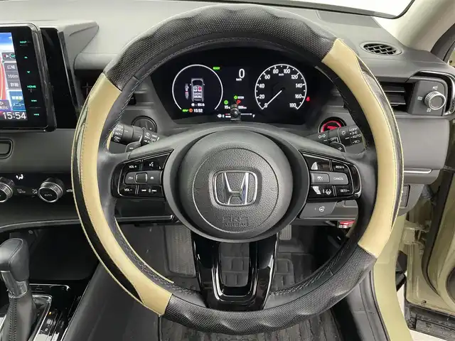 ホンダ ヴェゼル ハイブリッド e:HEV Z 富山県 2023(令5)年 2.9万km サンドカーキパール ワンオーナー/寒冷地仕様/社外9型ナビ【MDV-M909HDF】/(AM/FM/CD/DVD?SD/USB/BT/HDMI)/フルセグTV/バックカメラ/衝突被害軽減ブレーキ/レーンキープアシスト/アダプティブクルーズコントロール/ブラインドスポットモニター/クリアランスソナー/アダプティブハイビーム/LEDヘッドライト/電動リアゲート/ハーフレザーシート/前席シートヒーター/ETC/ドライブレコーダー前後/ステアリングヒーター/ステアリングカバー/スマートキー×２/プッシュスタート/純正18インチAW/ドアバイザー/取扱説明書/保証書