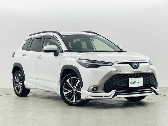 トヨタ カローラ クロス ハイブリッド Z 福島県 2023(令5)年 1.7万km プラチナホワイトパールマイカ ワンオーナー/純正ディスプレイオーディオナビ付き　/トヨタセーフティーセンス　/・PCS/・LTA/・BSM/・クリアランスソナー/・PKSB/・RSA/・ACC/前後ドライブレコーダー　/モデリスタエアロ　/ＥＴＣ　/パワーバックドア　/電子パーキング　/・ブレーキホールド　/ハーフレザーシート/・シートヒーター/・パワーシート/ルーフレール　/プッシュスタート/・スマートキー/・スペアキー/LEDライト/・オートライト/・フォグライト/純正フロアマット/・ドアバイザー/取扱説明書/・保証書