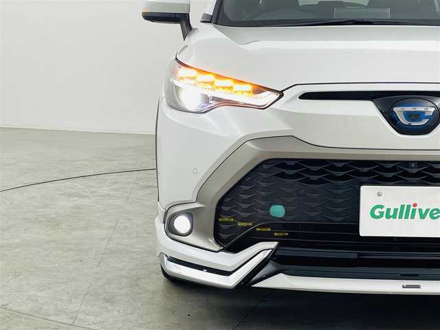 トヨタ カローラ クロス ハイブリッド Z 福島県 2023(令5)年 1.7万km プラチナホワイトパールマイカ ワンオーナー/純正ディスプレイオーディオナビ付き　/トヨタセーフティーセンス　/・PCS/・LTA/・BSM/・クリアランスソナー/・PKSB/・RSA/・ACC/前後ドライブレコーダー　/モデリスタエアロ　/ＥＴＣ　/パワーバックドア　/電子パーキング　/・ブレーキホールド　/ハーフレザーシート/・シートヒーター/・パワーシート/ルーフレール　/プッシュスタート/・スマートキー/・スペアキー/LEDライト/・オートライト/・フォグライト/純正フロアマット/・ドアバイザー/取扱説明書/・保証書