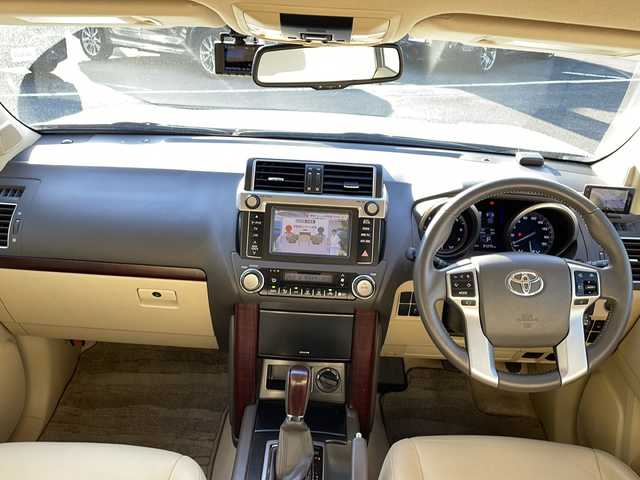 トヨタ ランドクルーザー プラド TX Lパッケージ 新潟県 2015(平27)年 5.2万km ホワイトパールクリスタルシャイン ワンオーナー/エンジンスターター/冬タイヤ積載/純正SDナビ/（DTV/DVD/Bluetooth）/フロントカメラ/サイドカメラ/バックカメラ/４WD/センターデフロック/クルーズコントロール/コーナーセンサー/ビルドインETC/ドライブレコーダー/自動防眩ミラー/ベージュレザーシート/前席シートヒーター/前席電動シート/オートライト/フォグランプ/ウィンカーミラー/ドアバイザー/スペアキー×１