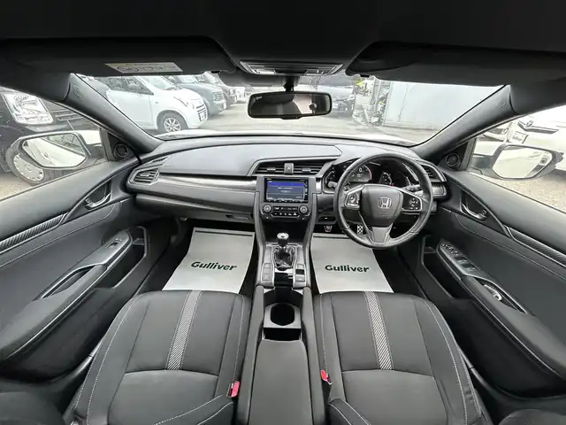 ホンダ シビック ハッチバック ホンダセンシング 山形県 2018(平30)年 8.6万km ホワイトオーキッドパール 禁煙車/純正SDナビ/・フルセグ/CD/DVD/AM/FM/衝突軽減ブレーキ/アダプティブクルーズコントロール/横滑り防止装置/レーンキープアシスト/アイドリングストップ/盗難防止装置/コーナーセンサー/バックカメラ/オートライト/LEDライト/フォグランプ/純正18インチアルミホイール/純正フロアマット/前席シートヒーター/ETC