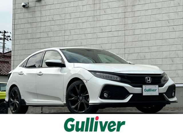 ホンダ シビック ハッチバック ホンダセンシング 山形県 2018(平30)年 8.6万km ホワイトオーキッドパール 禁煙車/純正SDナビ/・フルセグ/CD/DVD/AM/FM/衝突軽減ブレーキ/アダプティブクルーズコントロール/横滑り防止装置/レーンキープアシスト/アイドリングストップ/盗難防止装置/コーナーセンサー/バックカメラ/オートライト/LEDライト/フォグランプ/純正18インチアルミホイール/純正フロアマット/前席シートヒーター/ETC