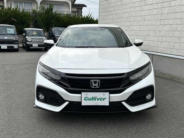 ホンダ シビック ハッチバック ホンダセンシング 山形県 2018(平30)年 8.6万km ホワイトオーキッドパール 禁煙車/純正SDナビ/・フルセグ/CD/DVD/AM/FM/衝突軽減ブレーキ/アダプティブクルーズコントロール/横滑り防止装置/レーンキープアシスト/アイドリングストップ/盗難防止装置/コーナーセンサー/バックカメラ/オートライト/LEDライト/フォグランプ/純正18インチアルミホイール/純正フロアマット/前席シートヒーター/ETC