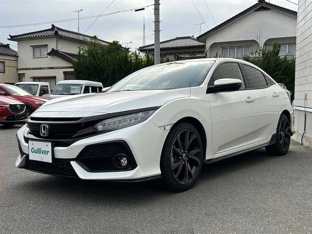 ホンダ シビック ハッチバック ホンダセンシング 山形県 2018(平30)年 8.6万km ホワイトオーキッドパール 禁煙車/純正SDナビ/・フルセグ/CD/DVD/AM/FM/衝突軽減ブレーキ/アダプティブクルーズコントロール/横滑り防止装置/レーンキープアシスト/アイドリングストップ/盗難防止装置/コーナーセンサー/バックカメラ/オートライト/LEDライト/フォグランプ/純正18インチアルミホイール/純正フロアマット/前席シートヒーター/ETC