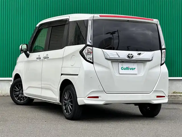 トヨタ ルーミー カスタムG 宮城県 2021(令3)年 5.3万km パールホワイトⅢ パノラミックビュー対応ナビレディパッケージ/・パノラミックビューモニター/・ステアリングスイッチ/コンフォートパッケージ/・シートヒーター（運転席/助手席）/・シートバックテーブル（運転席/助手席）/＝＝＝/スマートアシスト/・衝突回避支援ブレーキ機能/・車線逸脱警報機能/・ブレーキ制御付誤発進抑制機能/・先行車発進お知らせ機能/・アダプティブクルーズコントロール/・アダプティブドライビングビーム/・衝突警報機能/・ふらつき警報機能/・サイドビューランプ/・コーナーセンサー/・路側逸脱警報/・標識認識機能/社外9インチナビ（AVIC-RQ911）/・CD/DVD/・Bluetooth/・フルセグTV/ビルトインETC/両側パワースライドドア/革調シートカバー/革巻きステアリング/ステアリングスイッチ/電動パーキングブレーキ/ブレーキホールド/LEDヘッドランプ/フォグランプ/オートライト/スマートキー＆プッシュスタート/電動格納ミラー/純正14インチAW/純正フロアマット/純正ドアバイザー/Wエアバッグ
