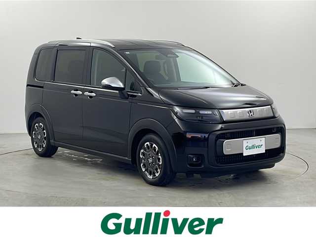 ホンダ フリード ハイブリット e:HEV クロスター 栃木県 2025(令7)年 0.1千km クリスタルブラックパール 登録済み未使用車/ホンダセンシング/・衝突軽減ブレーキ/・レーンキープアシスト/・渋滞追従機能付アダプティブクルーズコントロール/・誤発進抑制/・路外逸脱抑制/・旧発進抑制/・ブラインドスポットインフォメーション/・パーキングセンサーシステム/・歩行者事故低減ステアリング/。オートハイビーム/・標識認識/・先行者発進お知らせ/横滑り防止装置/両側パワースライドドア/コンビネーションシート(合皮)/シートヒーター(D/N席)/ステアリングスイッチ/LEDヘッドライト/LEDフォグランプ/純正15インチアルミホイール/プッシュスタート/スマートキー×2本/サイド+カーテンエアバッグ/保証書、取扱説明書