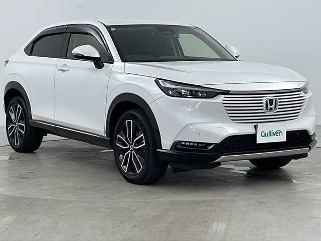ホンダ ヴェゼル ハイブリッド e:HEV Z 道央・札幌 2024(令6)年 0.6万km プラチナホワイトパール ・４ＷＤ/・寒冷地/・純正メモリナビ（ＢＴ＆ＵＳＢ＆フルセグ＆スマホ連携）/・ＣＭＢＳ/・ＡＣＣ先行車検知/・レーンキープアシスト/・ＢＳＭ/・標識認識機能/・パワーバックドア/・Ｄ／Ｎシートヒーター/・ステアリングヒーター/・レーダークルーズ/・ステアリングスィッチ/・パドルシフト/・コーナーセンサー/・ハーフレザーシート/・置くだけ充電/・ドアミラーヒーター/・ＬＥＤヘッドライト/・ＬＥＤフォグ/・スマートキー/・社外ドラレコ前後/・純正１８インチＡＷ
