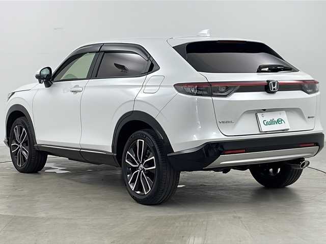 ホンダ ヴェゼル ハイブリッド e:HEV Z 道央・札幌 2024(令6)年 0.6万km プラチナホワイトパール ・４ＷＤ/・寒冷地/・純正メモリナビ（ＢＴ＆ＵＳＢ＆フルセグ＆スマホ連携）/・ＣＭＢＳ/・ＡＣＣ先行車検知/・レーンキープアシスト/・ＢＳＭ/・標識認識機能/・パワーバックドア/・Ｄ／Ｎシートヒーター/・ステアリングヒーター/・レーダークルーズ/・ステアリングスィッチ/・パドルシフト/・コーナーセンサー/・ハーフレザーシート/・置くだけ充電/・ドアミラーヒーター/・ＬＥＤヘッドライト/・ＬＥＤフォグ/・スマートキー/・社外ドラレコ前後/・純正１８インチＡＷ