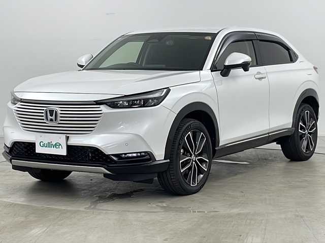 ホンダ ヴェゼル ハイブリッド e:HEV Z 道央・札幌 2024(令6)年 0.6万km プラチナホワイトパール ・４ＷＤ/・寒冷地/・純正メモリナビ（ＢＴ＆ＵＳＢ＆フルセグ＆スマホ連携）/・ＣＭＢＳ/・ＡＣＣ先行車検知/・レーンキープアシスト/・ＢＳＭ/・標識認識機能/・パワーバックドア/・Ｄ／Ｎシートヒーター/・ステアリングヒーター/・レーダークルーズ/・ステアリングスィッチ/・パドルシフト/・コーナーセンサー/・ハーフレザーシート/・置くだけ充電/・ドアミラーヒーター/・ＬＥＤヘッドライト/・ＬＥＤフォグ/・スマートキー/・社外ドラレコ前後/・純正１８インチＡＷ