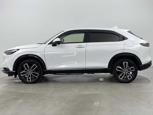 ホンダ ヴェゼル ハイブリッド e:HEV Z 道央・札幌 2024(令6)年 0.6万km プラチナホワイトパール ・４ＷＤ/・寒冷地/・純正メモリナビ（ＢＴ＆ＵＳＢ＆フルセグ＆スマホ連携）/・ＣＭＢＳ/・ＡＣＣ先行車検知/・レーンキープアシスト/・ＢＳＭ/・標識認識機能/・パワーバックドア/・Ｄ／Ｎシートヒーター/・ステアリングヒーター/・レーダークルーズ/・ステアリングスィッチ/・パドルシフト/・コーナーセンサー/・ハーフレザーシート/・置くだけ充電/・ドアミラーヒーター/・ＬＥＤヘッドライト/・ＬＥＤフォグ/・スマートキー/・社外ドラレコ前後/・純正１８インチＡＷ