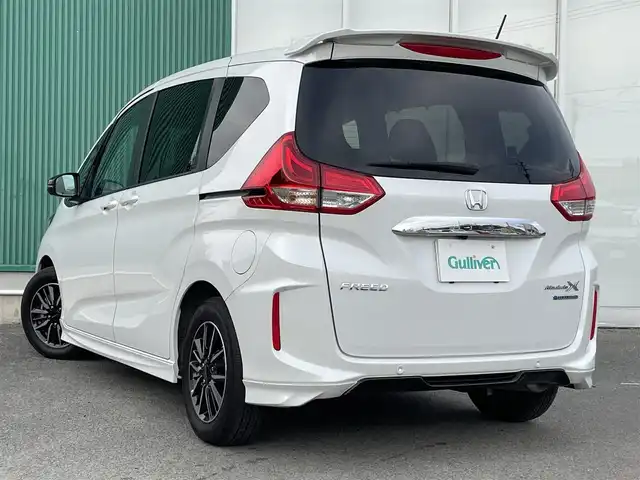 ホンダ フリード ハイブリット モデューロX 福岡県 2023(令5)年 1.4万km プラチナホワイトパール 社外ナビ（BT/フルセグ/DISC/AM/FM)/Bカメラ/両側パワースライドドア/レーダークルーズコントロール/LEDヘッドライト/オートライト/ハーフレザー/ウォークスルー/純正15インチAW/アイドリングストップ/横滑り防止装置/コーナーセンサー/レーンキープアシスト/盗難防止装置/衝突被害軽減システム/スマートキー/ETC