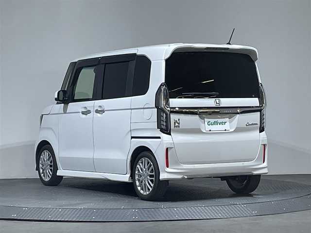 ホンダ Ｎ ＢＯＸ カスタム L ターボ 愛媛県 2022(令4)年 2.9万km プラチナホワイトパール 純正８インチナビ/（CD/DVD/TV/BT）/バックカメラ　/両側パワスラ　/革調シートカバー/前席シートカバー　/ビルトインETC　/純正前後ドラレコ　/純正アルミホイール