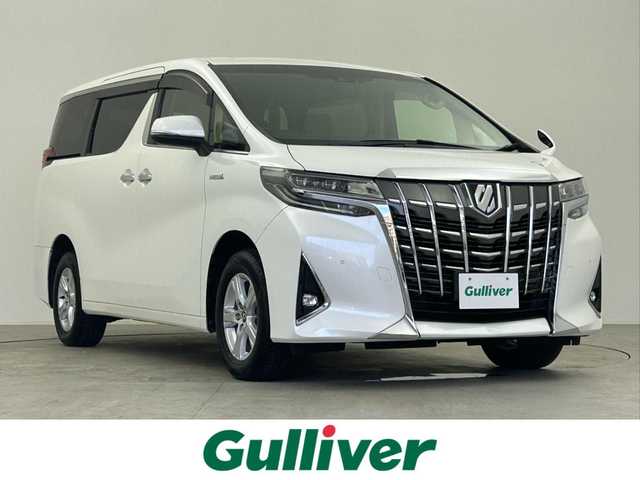 トヨタ アルファードハイブリット X 千葉県 2019(平31)年 7.3万km ホワイトパールクリスタルシャイン フリップダウンモニター/トヨタセーフティセンス/・プリクラッシュセーフティ/・レーンディパーチャーアラート/・ロードサインアシスト/・クリアランスソナー/・オートハイビーム/純正10インチSDナビ/CD DVD SD BT フルセグ/バックカメラ/両側パワースライドドア/アダプティブクルーズコントロール/LEDオートライト/純正16インチアルミホイール/革巻きステアリング/プッシュスタート/スマートキー/ETC2.0