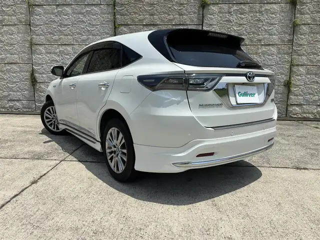 トヨタ ハリアー ハイブリッド プレミアム アドバンスドP 長崎県 2014(平26)年 9.1万km ホワイトパールクリスタルシャイン パノラマルーフ/モデリスタエアロ(F/R/R下)/純正メモリナビ/(CD/DVD/BT/フルセグ)/全方位カメラ/JBLサウンドシステム/衝突軽減ブレーキ/レーダークルーズ/レーンアシスト/コーナーセンサー/パワーバックドア /レザーシート/パワーシート/シートヒーター/ドライブレコーダー/オートライト/オートハイビーム/ステアリングスイッチ/ETC2.0/純正18インチAW