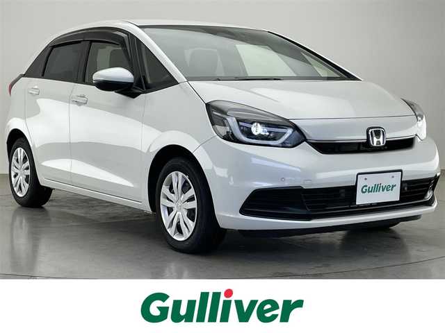 ホンダ フィット e:HEVホーム 愛知県 2022(令4)年 1.6万km プラチナホワイトパール 純正メモリナビ　バックカメラ　ＵＳＢ　純正ドライブレコーダー　電動パーキングブレーキ　ＥＴＣ　ＬＥＤオートライト　ホンダセンシング　衝突軽減　レーンキープアシスト　追従クルコン　ハンドル支援　禁煙車