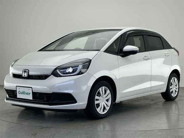 ホンダ フィット e:HEVホーム 愛知県 2022(令4)年 1.6万km プラチナホワイトパール 純正メモリナビ　バックカメラ　ＵＳＢ　純正ドライブレコーダー　電動パーキングブレーキ　ＥＴＣ　ＬＥＤオートライト　ホンダセンシング　衝突軽減　レーンキープアシスト　追従クルコン　ハンドル支援　禁煙車
