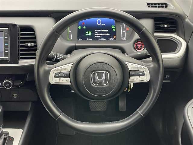 ホンダ フィット e:HEVホーム 愛知県 2022(令4)年 1.6万km プラチナホワイトパール 純正メモリナビ　バックカメラ　ＵＳＢ　純正ドライブレコーダー　電動パーキングブレーキ　ＥＴＣ　ＬＥＤオートライト　ホンダセンシング　衝突軽減　レーンキープアシスト　追従クルコン　ハンドル支援　禁煙車