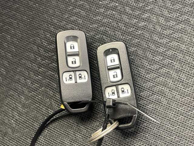 ホンダ Ｎ ＢＯＸ カスタム G SSパッケージ 三重県 2014(平26)年 7万km プレミアムゴールドパープルパール /禁煙車　//社外ナビ　//両側パワースライドドア　//ＣＴＢＡ　//ＥＴＣ　//ドラレコ　//フォグライト　//ＨＩＤライト　//オートライト　//純正アルミ　//プッシュスタート//スマートキー//取扱説明書//保証書//スペアキー