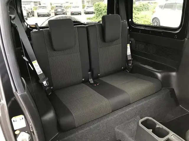 スズキ ジムニー XL 鳥取県 2021(令3)年 1.5万km ブルーイッシュブラックパール3 ワンオーナー/４WD・ターボ車/社外10インチディスプレイオーディオ/BT/ドライブレコーダー前方のみ/前席シートヒーター/フォグライト/純正16インチホイール/プッシュエンジンスタート/アイドリングストップ/背面タイヤ/スタットレスセット積込/（タイヤ溝　６－７部山）/フロアマット/背面タイヤカバー/保証書・取扱説明書