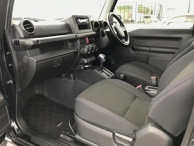 スズキ ジムニー XL 鳥取県 2021(令3)年 1.5万km ブルーイッシュブラックパール3 ワンオーナー/４WD・ターボ車/社外10インチディスプレイオーディオ/BT/ドライブレコーダー前方のみ/前席シートヒーター/フォグライト/純正16インチホイール/プッシュエンジンスタート/アイドリングストップ/背面タイヤ/スタットレスセット積込/（タイヤ溝　６－７部山）/フロアマット/背面タイヤカバー/保証書・取扱説明書