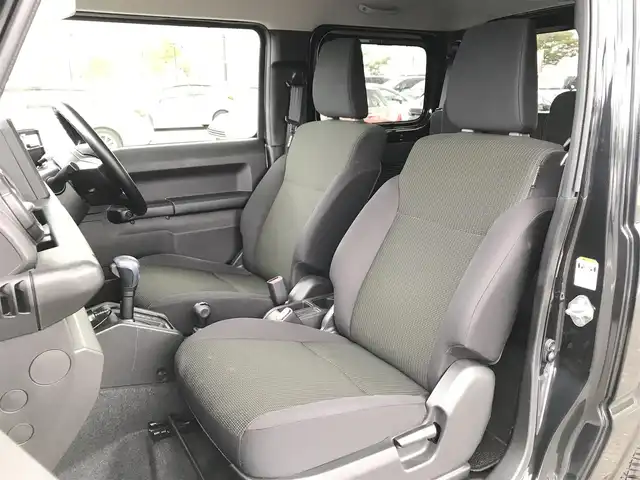 スズキ ジムニー XL 鳥取県 2021(令3)年 1.5万km ブルーイッシュブラックパール3 ワンオーナー/４WD・ターボ車/社外10インチディスプレイオーディオ/BT/ドライブレコーダー前方のみ/前席シートヒーター/フォグライト/純正16インチホイール/プッシュエンジンスタート/アイドリングストップ/背面タイヤ/スタットレスセット積込/（タイヤ溝　６－７部山）/フロアマット/背面タイヤカバー/保証書・取扱説明書