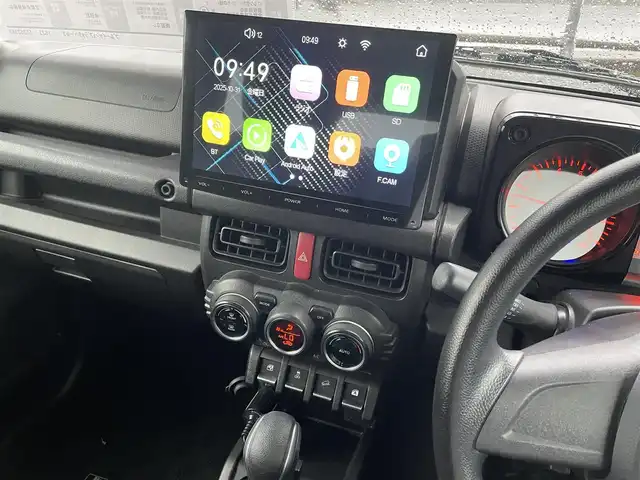 スズキ ジムニー XL 鳥取県 2021(令3)年 1.5万km ブルーイッシュブラックパール3 ワンオーナー/４WD・ターボ車/社外10インチディスプレイオーディオ/BT/ドライブレコーダー前方のみ/前席シートヒーター/フォグライト/純正16インチホイール/プッシュエンジンスタート/アイドリングストップ/背面タイヤ/スタットレスセット積込/（タイヤ溝　６－７部山）/フロアマット/背面タイヤカバー/保証書・取扱説明書