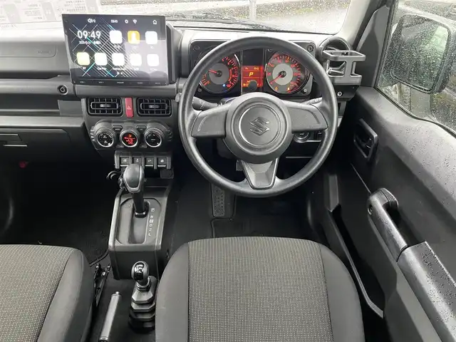 スズキ ジムニー XL 鳥取県 2021(令3)年 1.5万km ブルーイッシュブラックパール3 ワンオーナー/４WD・ターボ車/社外10インチディスプレイオーディオ/BT/ドライブレコーダー前方のみ/前席シートヒーター/フォグライト/純正16インチホイール/プッシュエンジンスタート/アイドリングストップ/背面タイヤ/スタットレスセット積込/（タイヤ溝　６－７部山）/フロアマット/背面タイヤカバー/保証書・取扱説明書