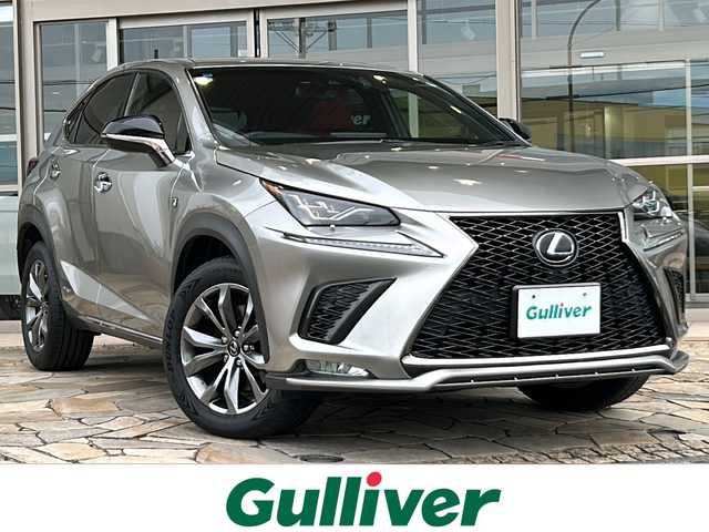 レクサス ＮＸ 300h Fスポーツ 静岡県 2018(平30)年 9.3万km ソニックチタニウム 純正ナビ/・ラジオ/フルセグTV/Miracast/・CD/DVD/SD/USB/AUX/Bluetooth/主要装備/・レーダークルーズコントロール　/・ドライブレコーダー　/・サンルーフ　/・バックカメラ　/・シートメモリー　/・シートヒーター　/・エアシート　/・ハンドルヒーター　/・パワーバックドア　/・オートハイビーム　/・オートライト/・レーンキープアシスト/・テレスコピックステアリング/・パドルシフト/・ホールド/・ヒーテッドドアミラー/・プッシュスタート/・スマートキー/・プリクラッシュセーフティー/・SOSコール/・レザーシート/・モデリスタエアロ/・純正アルミホイール/・純正フロアマット