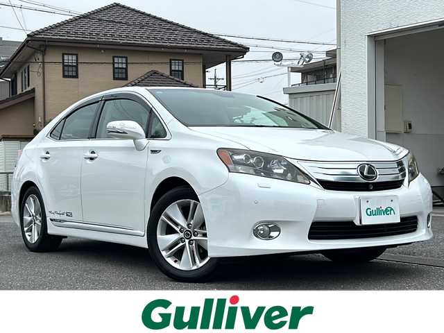 レクサス ＨＳ 250h バージョンI 岐阜県 2010(平22)年 12.5万km ホワイトパールクリスタルシャイン /メーカー純正ナビ(ワンセグTV/AM/FM/DISC/HDD)//レーダークルーズコントロール//ヘッドアップディスプレイ//シートヒーター//シートベンチレーター//前席パワーシート//ETC//ドライビングメモリースイッチ//ワイドビューフロントカメラ//ヘッドライトクリーナースイッチ//リアサンシェードスイッチ//USB入力端子//AUX入力端子//プッシュスタート//純正フロアマット//取説//保証書