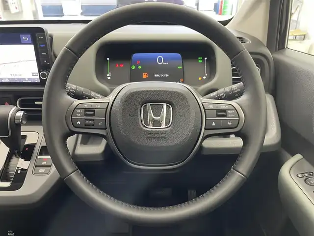 ホンダ フリード ハイブリット e:HEV クロスター 滋賀県 2025(令7)年 0.1千km クリスタルブラックパール 登録済未使用車/純正９インチナビ(AM/FM/フルセグ/Bluetooth/AppleCarAuto/AndroidAuto)/ＢＳＭ/両側電動ドア/追従クルーズコントロール/シートヒーター/ＬＥＤヘッドライト/コーナーセンサー/オートライト/バックカメラ/横滑り防止装置/レーンキープアシスト/衝突軽減システム/電子パーキング/オートホールドブレーキ/プッシュスタート/スマートキー×2