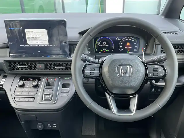 ホンダ ステップワゴン スパーダ eHEV 香川県 2025(令7)年 0.1千km プラチナホワイトパール 純正11.4インチメモリーナビ/→AM/FM/CD/DVD/Bluetooth/フルセグTV/バックカメラ/レーダークルーズコントロール/レーンキープアシスト/両側パワースライドドア/パワーバックドア/シートヒーター/LEDヘッドライト/ホンダセンシング/オットマン/コーナーセンサー/プッシュスタート/スマートキー/スペアキー×1/ステアリングスイッチ/サンシェード/革巻きステアリング/横滑り防止装置