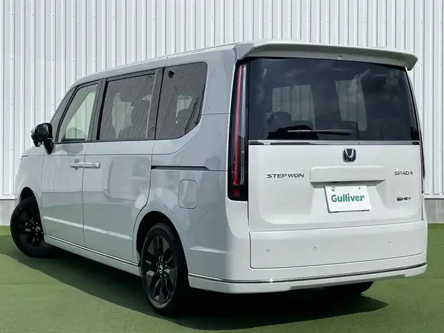 ホンダ ステップワゴン スパーダ eHEV 香川県 2025(令7)年 0.1千km プラチナホワイトパール 純正11.4インチメモリーナビ/→AM/FM/CD/DVD/Bluetooth/フルセグTV/バックカメラ/レーダークルーズコントロール/レーンキープアシスト/両側パワースライドドア/パワーバックドア/シートヒーター/LEDヘッドライト/ホンダセンシング/オットマン/コーナーセンサー/プッシュスタート/スマートキー/スペアキー×1/ステアリングスイッチ/サンシェード/革巻きステアリング/横滑り防止装置