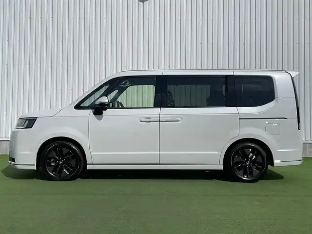 ホンダ ステップワゴン スパーダ eHEV 香川県 2025(令7)年 0.1千km プラチナホワイトパール 純正11.4インチメモリーナビ/→AM/FM/CD/DVD/Bluetooth/フルセグTV/バックカメラ/レーダークルーズコントロール/レーンキープアシスト/両側パワースライドドア/パワーバックドア/シートヒーター/LEDヘッドライト/ホンダセンシング/オットマン/コーナーセンサー/プッシュスタート/スマートキー/スペアキー×1/ステアリングスイッチ/サンシェード/革巻きステアリング/横滑り防止装置