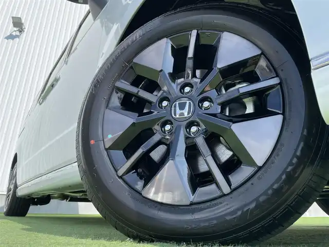 ホンダ ステップワゴン スパーダ eHEV 香川県 2025(令7)年 0.1千km プラチナホワイトパール 純正11.4インチメモリーナビ/→AM/FM/CD/DVD/Bluetooth/フルセグTV/バックカメラ/レーダークルーズコントロール/レーンキープアシスト/両側パワースライドドア/パワーバックドア/シートヒーター/LEDヘッドライト/ホンダセンシング/オットマン/コーナーセンサー/プッシュスタート/スマートキー/スペアキー×1/ステアリングスイッチ/サンシェード/革巻きステアリング/横滑り防止装置