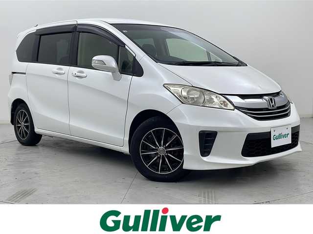 ホンダ フリード G ジャストセレクション 宮城県 2014(平26)年 3.2万km ホワイトオーキッドパール 禁煙車/純正7型インターナビ/・BT.CD.DVD.SD/・ワンセグTV/バックカメラ/片側パワースライドドア/ビルトインETC/ドライブレコーダー（FR）/ステアリングスイッチ/スマートキー/横滑り防止/アイドリングストップ/純正フロアマット/純正ドアバイザー/社外15インチAW/３列シート/オートライト/オートエアコン