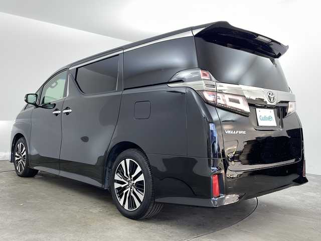 トヨタ ヴェルファイア Z Gエディション 兵庫県 2018(平30)年 7.4万km ブラック ・純正ナビ/Bluetooth/CD/DVD/USB/TV/・パノラミックビューモニター/・トヨタセーフティセンス/・プリクラッシュセーフティ/・レーントレーシングアシスト/・レーダクルーズコントロール/・ロードサインアシスト/・オートマチックハイビーム/・先行者発進告知機能/・ブラインドスポットモニター/・リヤクロストラフィックアラート/・インテリジェントクリアランスソナー/・ドライブスタートコントロール/・HDIM/・電子パーキングブレーキ/・オートホールドブレーキ/・革巻きステアリング/・ステアリングスイッチ/・ステアリングヒーター/・両側パワースライドドア/・パワーバックドア/・MTモード付AT/・フリップダウンモニター/・デジタルインナーミラー/・革シート/・前席パワーシート（運転席メモリ付き）/・前席シートヒーター/・前席エアシート/・純正フロアマット/・JBLプレミアムサウンド/・純正18インチアルミホイールタイヤ/・三眼LEDヘッドライト/・プッシュスタートボタン/・スマートキー/・ナノイー機能