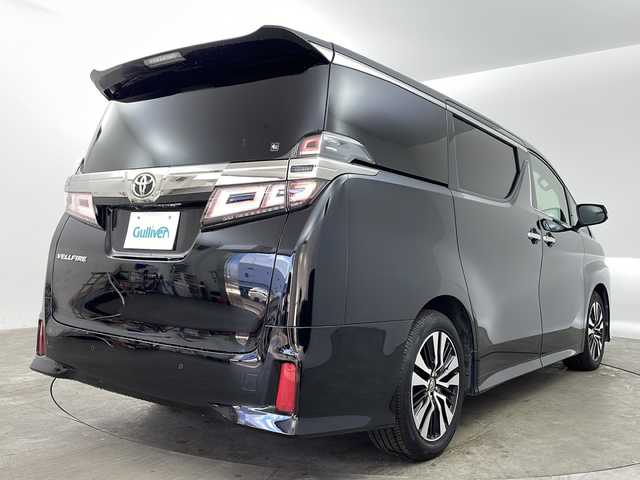 トヨタ ヴェルファイア Z Gエディション 兵庫県 2018(平30)年 7.4万km ブラック ・純正ナビ/Bluetooth/CD/DVD/USB/TV/・パノラミックビューモニター/・トヨタセーフティセンス/・プリクラッシュセーフティ/・レーントレーシングアシスト/・レーダクルーズコントロール/・ロードサインアシスト/・オートマチックハイビーム/・先行者発進告知機能/・ブラインドスポットモニター/・リヤクロストラフィックアラート/・インテリジェントクリアランスソナー/・ドライブスタートコントロール/・HDIM/・電子パーキングブレーキ/・オートホールドブレーキ/・革巻きステアリング/・ステアリングスイッチ/・ステアリングヒーター/・両側パワースライドドア/・パワーバックドア/・MTモード付AT/・フリップダウンモニター/・デジタルインナーミラー/・革シート/・前席パワーシート（運転席メモリ付き）/・前席シートヒーター/・前席エアシート/・純正フロアマット/・JBLプレミアムサウンド/・純正18インチアルミホイールタイヤ/・三眼LEDヘッドライト/・プッシュスタートボタン/・スマートキー/・ナノイー機能