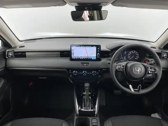 ホンダ ヴェゼル ハイブリッド e:HEV Z 富山県 2025(令7)年 0.1千km クリスタルブラックパール 登録済未使用車/ワンオーナー/４WD/純正9型ナビ/（BT/AM/FM/CD/DVD/Apple Car Play/Android Auto/USB)/フルセグTV/バックカメラ/衝突軽減ブレーキ/ヒルディセントコントロール/アダプティブクルーズコントロール/レーンキープアシスト/ブラインドスポットモニター/コーナーセンサー/電動リアゲート/置くだけ充電（ワイヤレス）/シートヒーター/ステアリングヒーター/ETC/パドルシフト/スマートキー×2/プッシュスタート/ドアバイザー/説明書／保証書