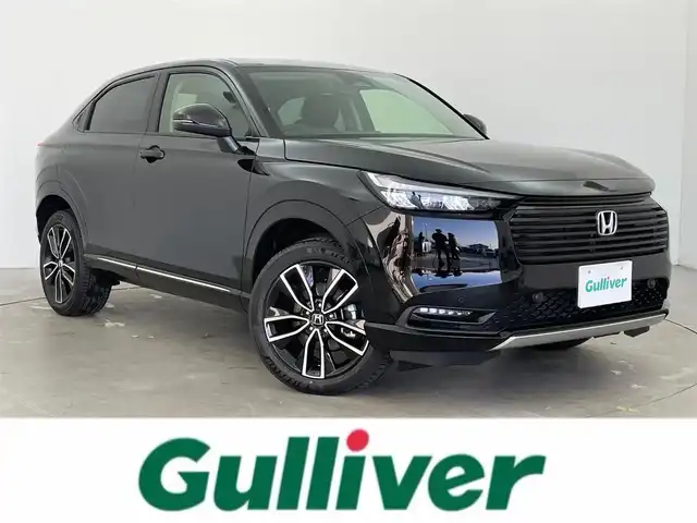 ホンダ ヴェゼル ハイブリッド e:HEV Z 富山県 2025(令7)年 0.1千km クリスタルブラックパール 登録済未使用車/ワンオーナー/４WD/純正9型ナビ/（BT/AM/FM/CD/DVD/Apple Car Play/Android Auto/USB)/フルセグTV/バックカメラ/衝突軽減ブレーキ/ヒルディセントコントロール/アダプティブクルーズコントロール/レーンキープアシスト/ブラインドスポットモニター/コーナーセンサー/電動リアゲート/置くだけ充電（ワイヤレス）/シートヒーター/ステアリングヒーター/ETC/パドルシフト/スマートキー×2/プッシュスタート/ドアバイザー/説明書／保証書