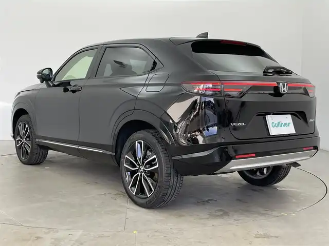 ホンダ ヴェゼル ハイブリッド e:HEV Z 富山県 2025(令7)年 0.1千km クリスタルブラックパール 登録済未使用車/ワンオーナー/４WD/純正9型ナビ/（BT/AM/FM/CD/DVD/Apple Car Play/Android Auto/USB)/フルセグTV/バックカメラ/衝突軽減ブレーキ/ヒルディセントコントロール/アダプティブクルーズコントロール/レーンキープアシスト/ブラインドスポットモニター/コーナーセンサー/電動リアゲート/置くだけ充電（ワイヤレス）/シートヒーター/ステアリングヒーター/ETC/パドルシフト/スマートキー×2/プッシュスタート/ドアバイザー/説明書／保証書