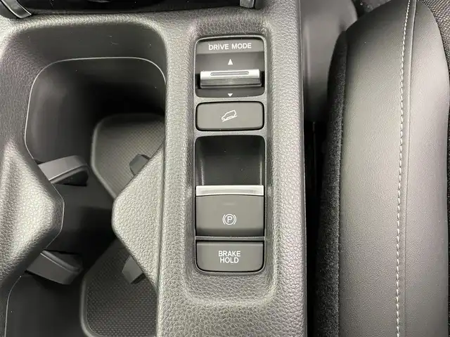 ホンダ ヴェゼル ハイブリッド e:HEV Z 富山県 2025(令7)年 0.1千km クリスタルブラックパール 登録済未使用車/ワンオーナー/４WD/純正9型ナビ/（BT/AM/FM/CD/DVD/Apple Car Play/Android Auto/USB)/フルセグTV/バックカメラ/衝突軽減ブレーキ/ヒルディセントコントロール/アダプティブクルーズコントロール/レーンキープアシスト/ブラインドスポットモニター/コーナーセンサー/電動リアゲート/置くだけ充電（ワイヤレス）/シートヒーター/ステアリングヒーター/ETC/パドルシフト/スマートキー×2/プッシュスタート/ドアバイザー/説明書／保証書