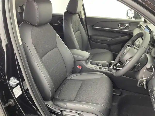 ホンダ ヴェゼル ハイブリッド e:HEV Z 富山県 2025(令7)年 0.1千km クリスタルブラックパール 登録済未使用車/ワンオーナー/４WD/純正9型ナビ/（BT/AM/FM/CD/DVD/Apple Car Play/Android Auto/USB)/フルセグTV/バックカメラ/衝突軽減ブレーキ/ヒルディセントコントロール/アダプティブクルーズコントロール/レーンキープアシスト/ブラインドスポットモニター/コーナーセンサー/電動リアゲート/置くだけ充電（ワイヤレス）/シートヒーター/ステアリングヒーター/ETC/パドルシフト/スマートキー×2/プッシュスタート/ドアバイザー/説明書／保証書