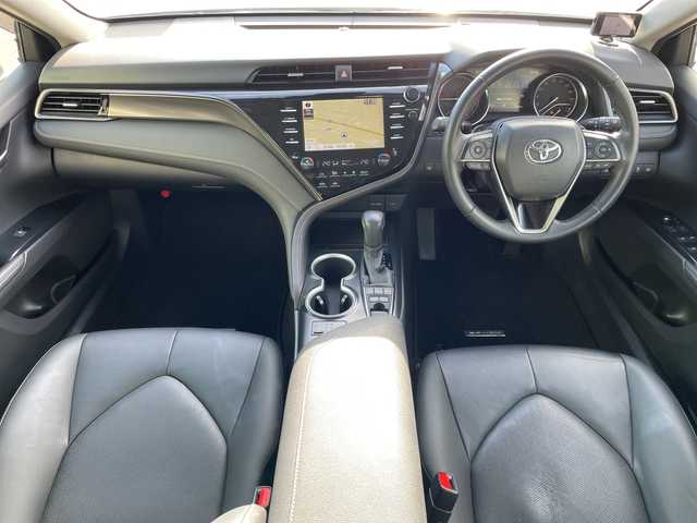 トヨタ カムリ WSレザーパッケージ 青森県 2019(令1)年 4.8万km プラチナホワイトパールマイカ 4WD/寒冷地仕様/純正Tコネクトナビ・フルセグTV/Bluetooth・Miracast/バックカメラ/本革シート/前席パワーシート・シートヒーター/ヘッドアップディスプレイ/セーフティセンス/プリクラッシュセーフティ/レーダークルーズコントロール/レーンディパーチャーアラート/オートマチックハイビーム/ブラインドスポットモニター/インテリジジュントクリアランスソナー/前後ドライブレコーダー/ビルトインETC/パドルシフト/ワイパーデアイサー/LEDヘッドライト/オートライト/LEDフォグランプ/リアフォグランプ/純正18インチアルミ/TRDエアロ